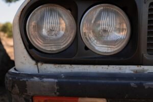 Front of a car with headlights and bumper