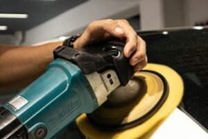 Machine polishing paint to remove scratches and water spots